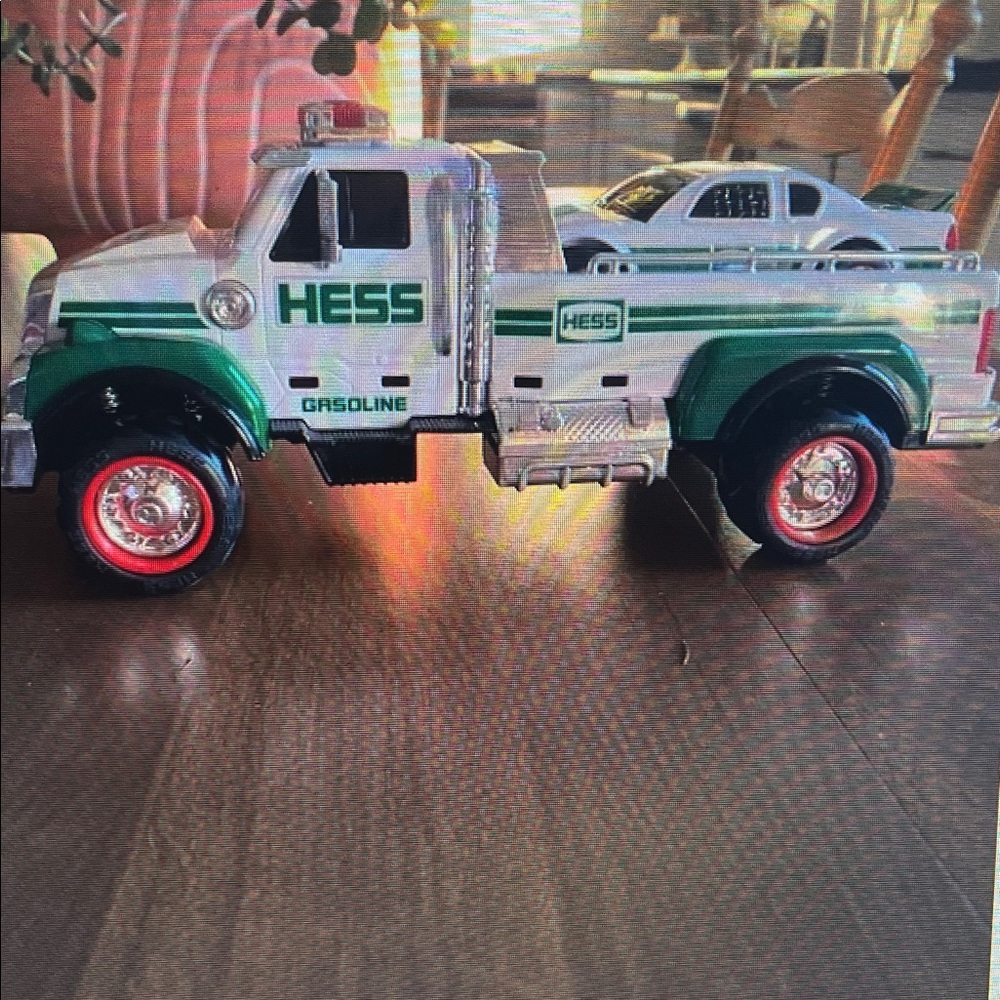 Green and White Toy Truck with Car